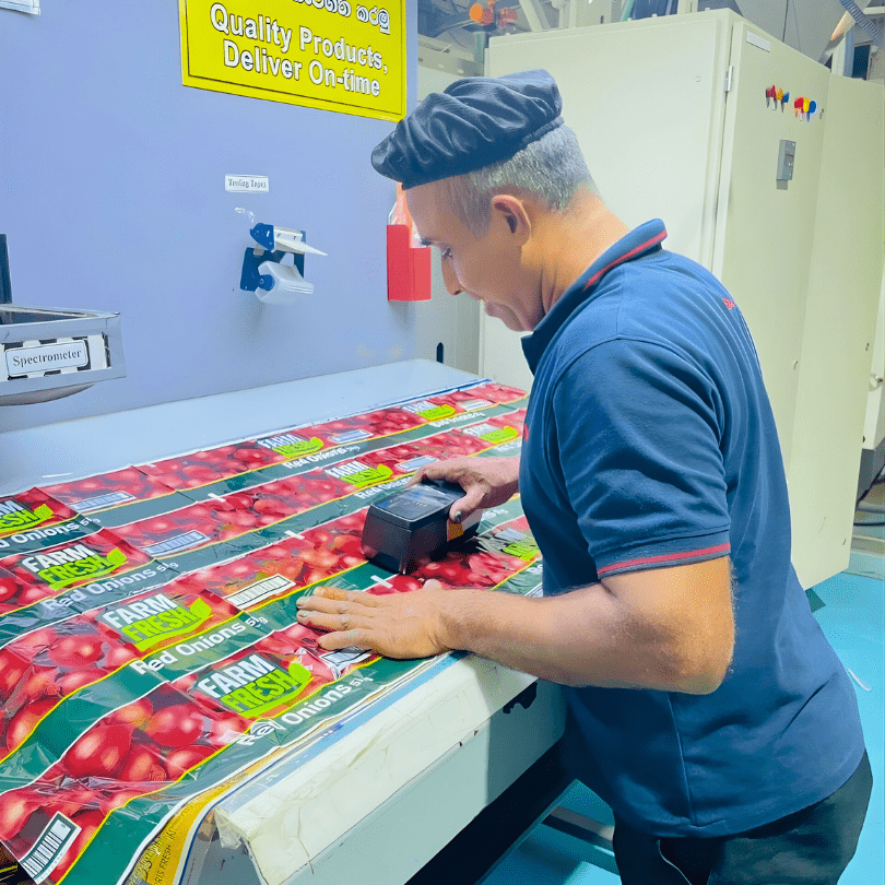 Our company employee checking colours on material.
